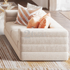 Современный тканевый диван в гостиной со столом